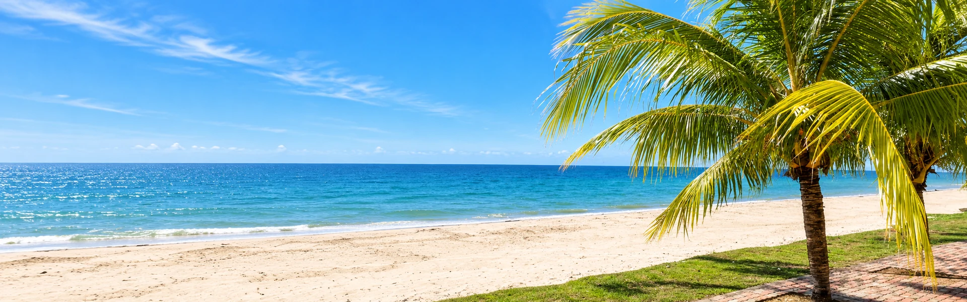 Beach with palm trees in Labuan, Malaysia