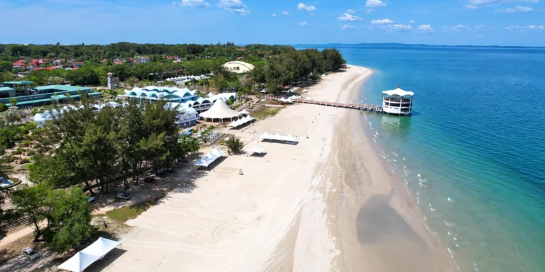 Aerial view of a white sand beach in Labuan